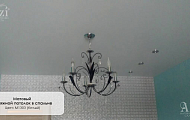 Матовый белый натяжной потолок в гостинной от Алези